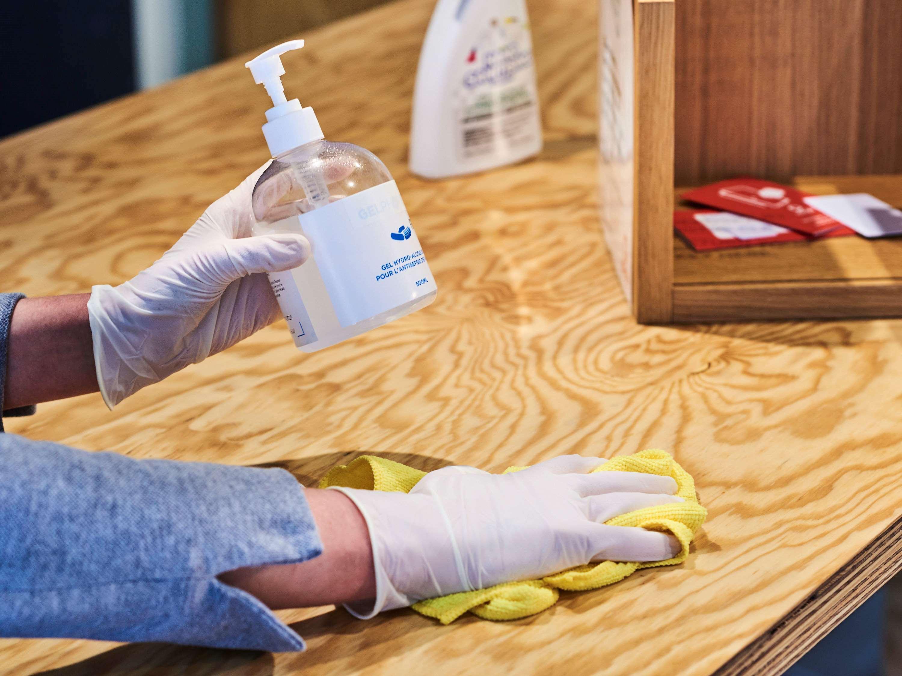 Novotel Chennai Sipcot Extérieur photo Disinfection of a table with a disinfectant